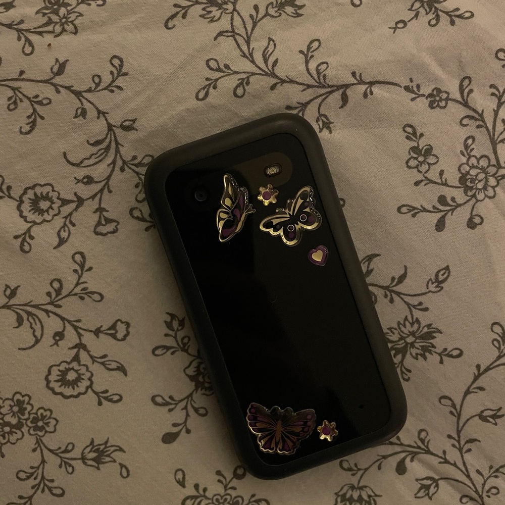 Nokia 2780 flip phone with Butterfly stickers